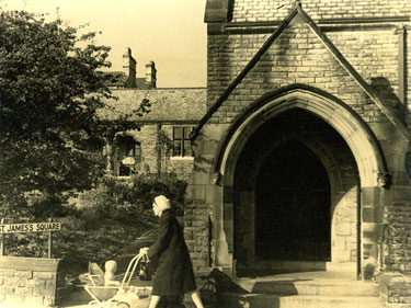 Entrance to St James's Church, Spring Bank, with partial view of Ingham Almshouses.