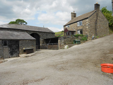 Hill Farm, Chinley. Mr Cooper in yard. Looking SE from SK 026 831.